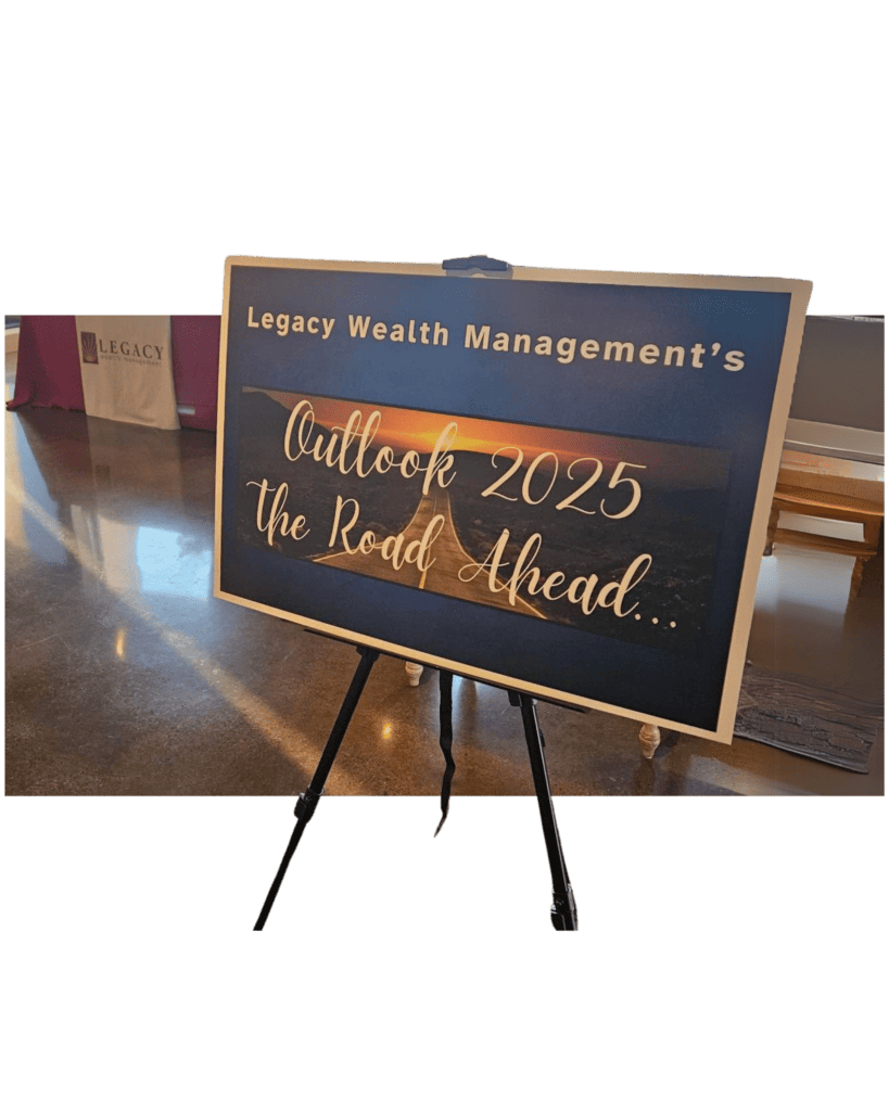 Poster board that says Outlook 2025 the Road Ahead from Legacy Wealth Managgement