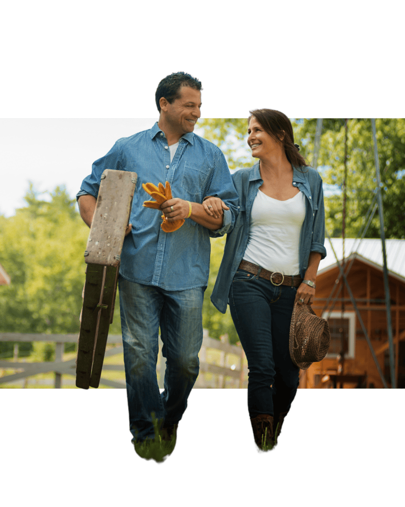 Middle aged man and woman working on a farm